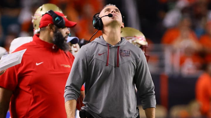 Oct 26, 2024; Miami Gardens, Florida, USA; Florida State Seminoles head coach Mike Norvell reacts from the sideline against the Miami Hurricanes during the fourth quarter at Hard Rock Stadium. Mandatory Credit: Sam Navarro-Imagn Images Oct 26, 2024; Miami Gardens, Florida, USA; Florida State Seminoles head coach Mike Norvell reacts from the sideline against the Miami Hurricanes during the fourth quarter at Hard Rock Stadium. Mandatory Credit: Sam Navarro-Imagn Images