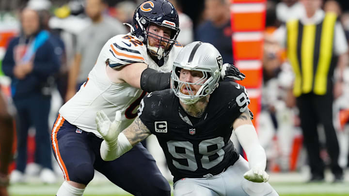 Sep 28, 2025; Paradise, Nevada, USA; Chicago Bears guard Joe Thuney (62) attempts to stop Las Vegas Raiders defensive end Maxx Crosby (98) during the second half at Allegiant Stadium.