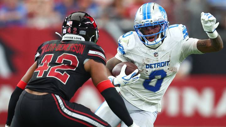 Oct 11, 2026; Glendale, Arizona, USA; Detroit Lions running back Jahmyr Gibbs (0) carries the ball defended by Arizona Cardinals safety Dadrion Taylor-Demerson (42) during the third quarter at State Farm Stadium. Mandatory Credit: Mark J. Rebilas-Imagn Images Oct 11, 2026; Glendale, Arizona, USA; Detroit Lions running back Jahmyr Gibbs (0) carries the ball defended by Arizona Cardinals safety Dadrion Taylor-Demerson (42) during the third quarter at State Farm Stadium. Mandatory Credit: Mark J. Rebilas-Imagn Images