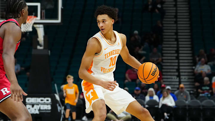 Nov 24, 2025; Las Vegas, NV, USA; Tennessee Volunteers forward Nate Ament (10) runs the offense as Rutgers Scarlet Knights guard Darren Buchanan Jr. (5) defends during the first half in a 2025 Players Era Festival group play game at MGM Grand Garden Arena. Mandatory Credit: Stephen R. Sylvanie-Imagn Images
