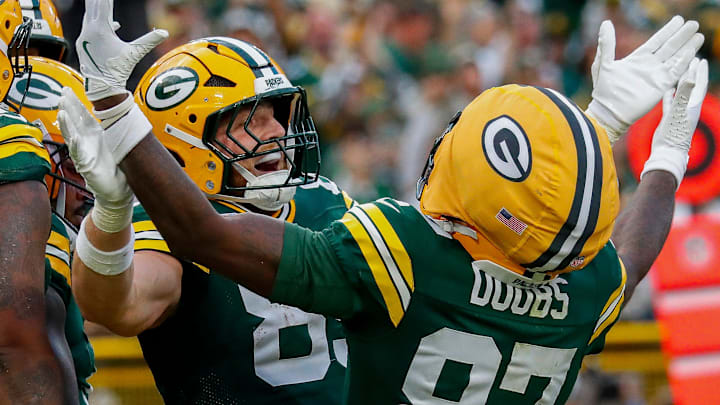 Green Bay Packers tight end Tucker Kraft (85) and wide receiver Romeo Doubs (87) celebrate Josh Jacobs' touchdown against the Bengals. Green Bay Packers tight end Tucker Kraft (85) and wide receiver Romeo Doubs (87) celebrate Josh Jacobs' touchdown against the Bengals.
