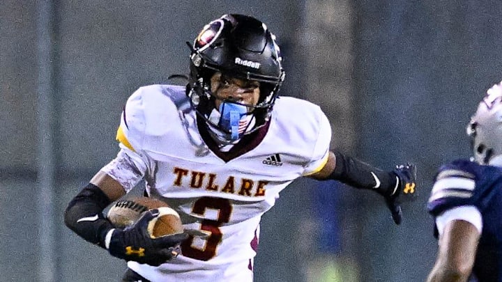 Tulare Union's Demaje Riley heads for the end zone against Clovis East in a CIF Central Section Division IAA high school football playoff on Friday, November 8, 2024.