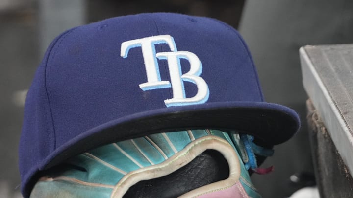 Sep 26, 2025; Toronto, Ontario, CAN; The hat and glove of Tampa Bay Rays third baseman Junior Caminero (13) in the dugout during the game against the Toronto Blue Jays at Rogers Centre. Sep 26, 2025; Toronto, Ontario, CAN; The hat and glove of Tampa Bay Rays third baseman Junior Caminero (13) in the dugout during the game against the Toronto Blue Jays at Rogers Centre.