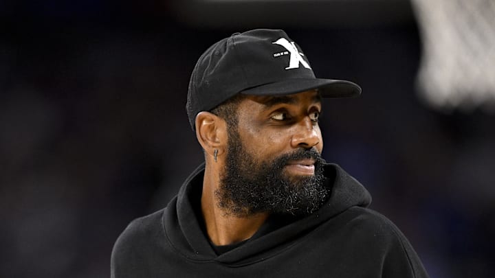 Dallas Mavericks guard Kyrie Irving walks on the court during the second half against the Oklahoma City Thunder. Dallas Mavericks guard Kyrie Irving walks on the court during the second half against the Oklahoma City Thunder.