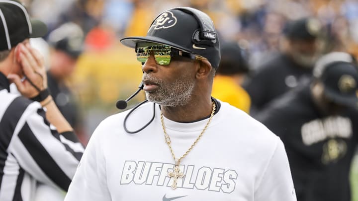 Nov 8, 2025; Morgantown, West Virginia, USA; Colorado Buffaloes head coach Deion Sanders walks along the sidelines late in the fourth quarter against the West Virginia Mountaineers at Milan Puskar Stadium. Mandatory Credit: Ben Queen-Imagn Images
