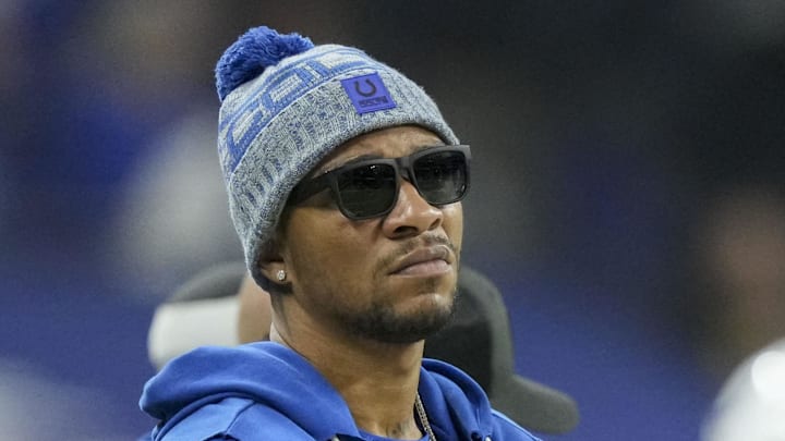 Indianapolis Colts quarterback Anthony Richardson (5) watches the action on the field from the sideline at Lucas Oil Stadium