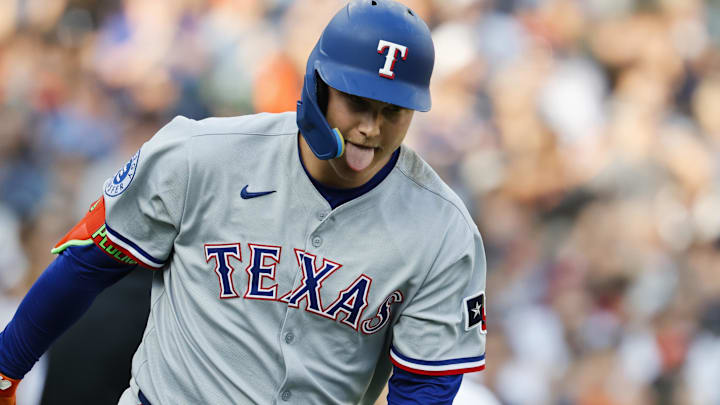 May 10, 2025; Detroit, Michigan, USA;  Texas Rangers designated hitter Joc Pederson (4) celebrates after he hits a two run home run in the third inning against the Detroit Tigers at Comerica Park. 