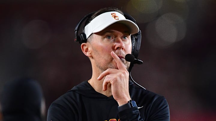 Nov 7, 2025; Los Angeles, California, USA; Southern California Trojans head coach Lincoln Riley watches game action against the Northwestern Wildcats during the second half at the Los Angeles Memorial Coliseum. Mandatory Credit: Gary A. Vasquez-Imagn Images Nov 7, 2025; Los Angeles, California, USA; Southern California Trojans head coach Lincoln Riley watches game action against the Northwestern Wildcats during the second half at the Los Angeles Memorial Coliseum. Mandatory Credit: Gary A. Vasquez-Imagn Images
