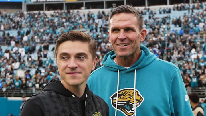 Jan 4, 2026; Jacksonville, Florida, USA; Jacksonville Jaguars general manager James Gladstone (left) and executive vice president of football operations Tony Boselli stand on the field after the game against the Tennessee Titans at EverBank Stadium. Jan 4, 2026; Jacksonville, Florida, USA; Jacksonville Jaguars general manager James Gladstone (left) and executive vice president of football operations Tony Boselli stand on the field after the game against the Tennessee Titans at EverBank Stadium.