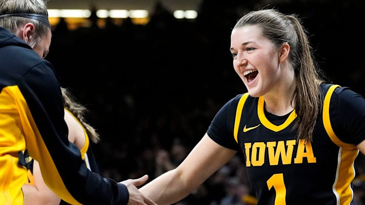Iowa guard Taylor Stremlow (1) celebrates with Iowa guard Callie Levin (32) on the bench during a basketball game against the Oregon Ducks Jan. 15, 2026 at Carver-Hawkeye Arena in Iowa City, Iowa.
