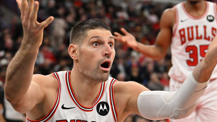 Dec 31, 2025; Chicago, Illinois, USA; Chicago Bulls center Nikola Vucevic (9) reacts against the New Orleans Pelicans during the second half at United Center. Mandatory Credit: Patrick Gorski-Imagn Images