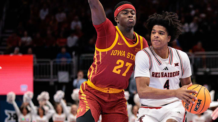 Mar 12, 2026; Kansas City, MO, USA; Texas Tech Red Raiders guard Christian Anderson (4) brings the ball up court around Iowa State Cyclones guard Killyan Toure (27) during the first half at T-Mobile Center. Mandatory Credit: William Purnell-Imagn Images