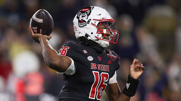 Nov 21, 2024; Atlanta, Georgia, USA; North Carolina State Wolfpack quarterback CJ Bailey (16) throws a pass against the Georgia Tech Yellow Jackets in the first quarter at Bobby Dodd Stadium at Hyundai Field. Mandatory Credit: Brett Davis-Imagn Images