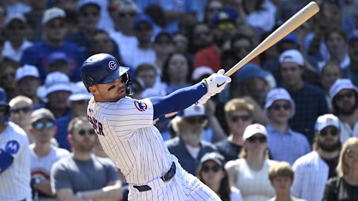Jun 19, 2025; Chicago, Illinois, USA; Chicago Cubs second base Nico Hoerner (2) hits an RBI single against the Milwaukee Brewers during the eighth inning at Wrigley Field. Jun 19, 2025; Chicago, Illinois, USA; Chicago Cubs second base Nico Hoerner (2) hits an RBI single against the Milwaukee Brewers during the eighth inning at Wrigley Field.