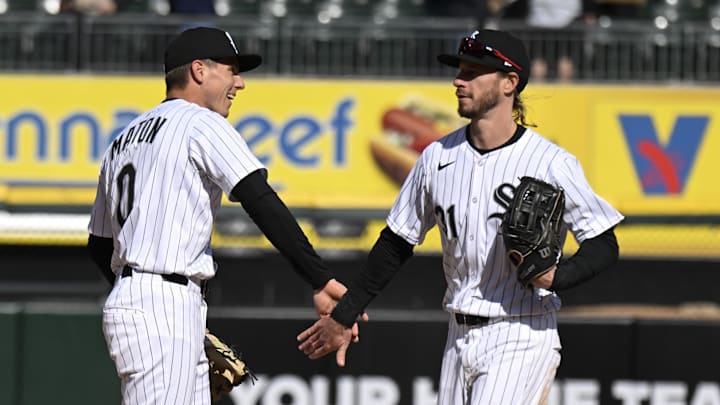Chicago White Sox third baseman Nick Maton (0) and outfielder Travis Jankowski (31) high five after a game against the Minnesota Twins at Rate Field. 