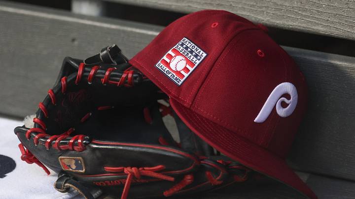 Jul 25, 2025; Bronx, New York, USA; A detailed view of a Hall of Fame patch on a Philadelphia Phillies hat resting in the dugout during the second inning against the New York Yankees at Yankee Stadium. Jul 25, 2025; Bronx, New York, USA; A detailed view of a Hall of Fame patch on a Philadelphia Phillies hat resting in the dugout during the second inning against the New York Yankees at Yankee Stadium.