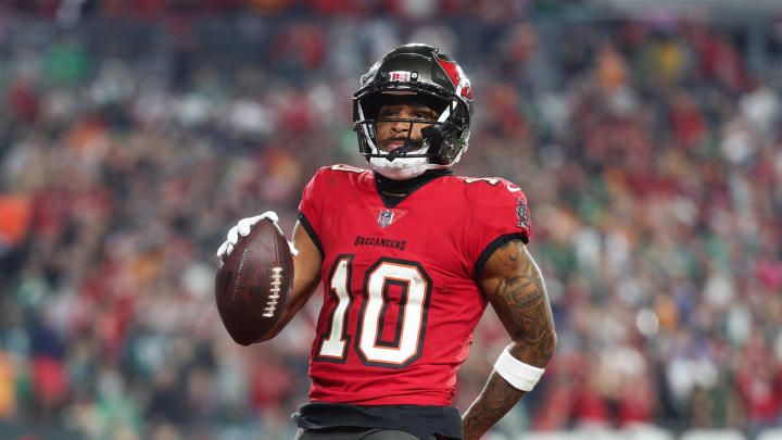 Jan 15, 2024; Tampa, Florida, USA; Tampa Bay Buccaneers wide receiver Trey Palmer (10) runs in a touchdown after a reception against the Philadelphia Eagles during the second half of a 2024 NFC wild card game at Raymond James Stadium. Mandatory Credit: Nathan Ray Seebeck-USA TODAY Sports