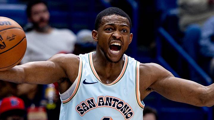 Feb 23, 2025; New Orleans, Louisiana, USA;  San Antonio Spurs guard De'Aaron Fox (4) reacts  to a play against the New Orleans Pelicans during the second half at Smoothie King Center. Mandatory Credit: Stephen Lew-Imagn Images