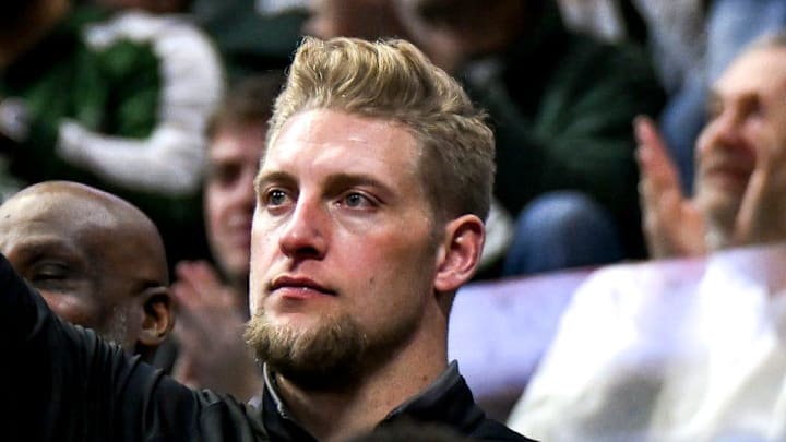 Max Bullough, Michigan State football's co-defensive coordinator and linebackers coach, celebrates after a MSU score against USC during the second half on Monday, Jan. 5, 2026, at the Breslin Center in East Lansing.