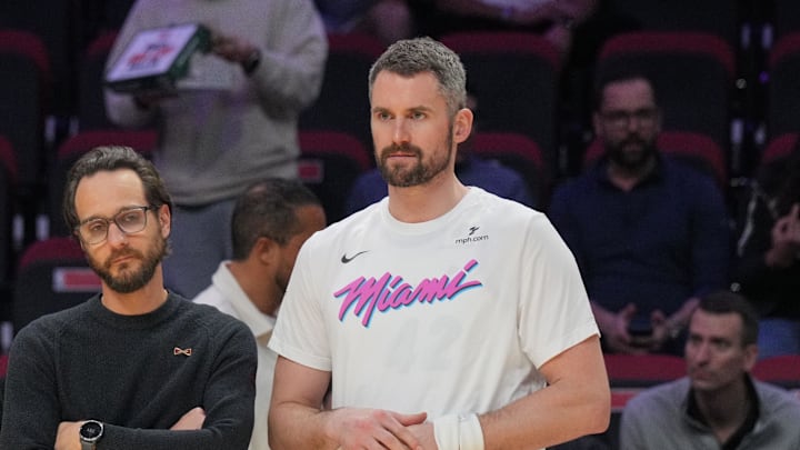 Jan 29, 2025; Miami, Florida, USA;  Miami Heat forward Kevin Love (42) looks on during warm-ups before the game against the Cleveland Cavaliers at Kaseya Center. Mandatory Credit: Jim Rassol-Imagn Images