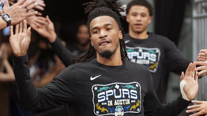 Feb 19, 2026; Austin, Texas, USA; San Antonio Spurs guard Stephon Castle (5) greets fans while entering the court before a game against the Phoenix Suns at Moody Center. Mandatory Credit: Scott Wachter-Imagn Images