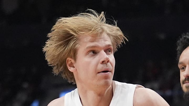 Toronto Raptors guard Gradey Dick looks to take a shot as New York Knicks guard Mikal Bridges.