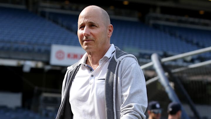 Jun 20, 2023; Bronx, New York, USA; New York Yankees general manager Brian Cashman on the field during batting practice before a game against the Seattle Mariners at Yankee Stadium. Mandatory Credit: Brad Penner-Imagn Images