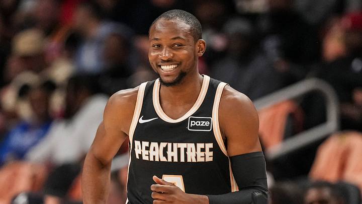 Feb 26, 2026; Atlanta, Georgia, USA; Atlanta Hawks forward Jonathan Kuminga (0) reacts after making a three point shot against the Washington Wizards during the first half at State Farm Arena. Mandatory Credit: Dale Zanine-Imagn Images