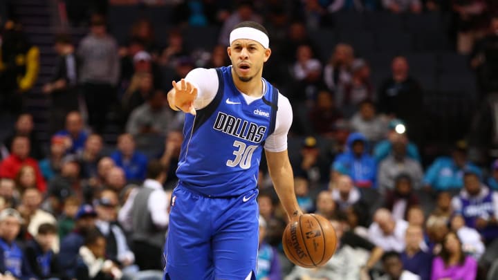 Feb 8, 2020; Charlotte, North Carolina, USA; Dallas Mavericks guard Seth Curry (30) sets up a play during the first half against the Charlotte Hornets forward Miles Bridges (0) during the first half at Spectrum Center. Mandatory Credit: Jeremy Brevard-USA TODAY Sports Feb 8, 2020; Charlotte, North Carolina, USA; Dallas Mavericks guard Seth Curry (30) sets up a play during the first half against the Charlotte Hornets forward Miles Bridges (0) during the first half at Spectrum Center. Mandatory Credit: Jeremy Brevard-USA TODAY Sports