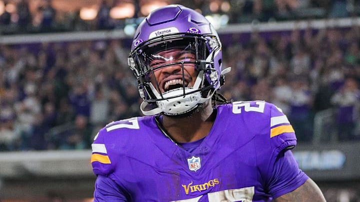 Dec 29, 2024; Minneapolis, Minnesota, USA; Minnesota Vikings running back Cam Akers (27) celebrates his touchdown against Green Bay Packers in the third quarter at U.S. Bank Stadium. Mandatory Credit: Brad Rempel-Imagn Images