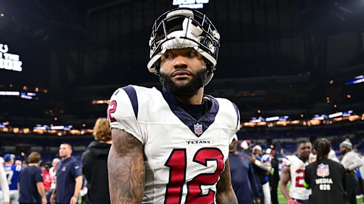 Jan 6, 2024; Indianapolis, Indiana, USA; Houston Texans wide receiver Nico Collins (12) walks off the field after a game against the Indianapolis Colts at Lucas Oil Stadium. Mandatory Credit: Marc Lebryk-USA TODAY Sports