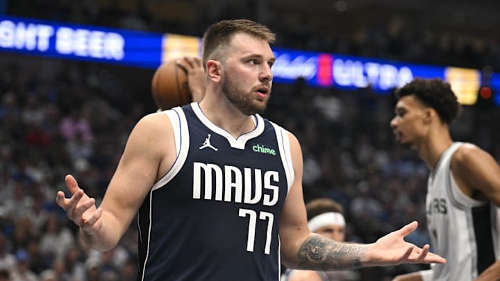 Oct 24, 2024; Dallas, Texas, USA; Dallas Mavericks guard Luka Doncic (77) reacts to a foul call during the second quarter against the San Antonio Spurs at the American Airlines Center. Mandatory Credit: Jerome Miron-Imagn Images Oct 24, 2024; Dallas, Texas, USA; Dallas Mavericks guard Luka Doncic (77) reacts to a foul call during the second quarter against the San Antonio Spurs at the American Airlines Center. Mandatory Credit: Jerome Miron-Imagn Images