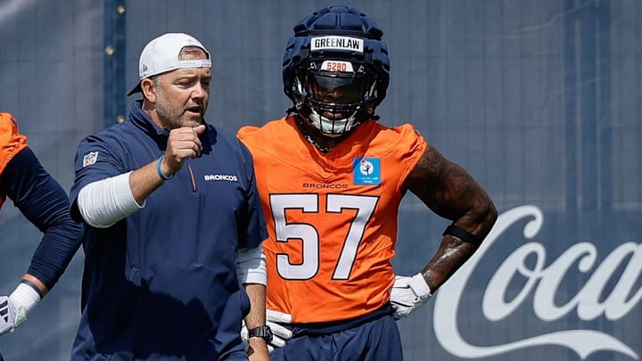Jul 24, 2025; Englewood, CO, USA; Denver Broncos inside linebackers coach Jeff Schmedding with linebackers Levelle Bailey (56), Justin Strnad (40), Drew Sanders (41), Dre Greenlaw (57), and Alex Singleton (49) during Denver Broncos Training Camp