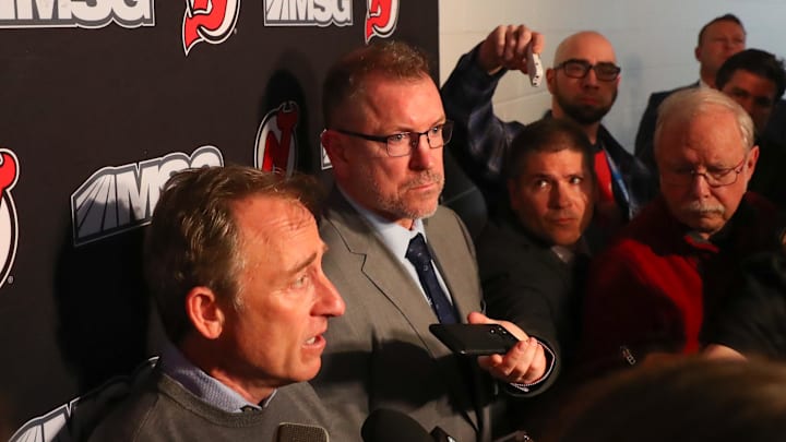 Jan 12, 2020; Newark, New Jersey, USA; New Jersey Devils owner Joshua Harris speaks to the media alongside interim general manager Tom Fitzgerald after the Devils and former general manager Ray Shero reached an agreement to part ways prior to the start of the NHL game between the New Jersey Devils and the Tampa Bay Lightning at Prudential Center. Mandatory Credit: Ed Mulholland-Imagn Images Jan 12, 2020; Newark, New Jersey, USA; New Jersey Devils owner Joshua Harris speaks to the media alongside interim general manager Tom Fitzgerald after the Devils and former general manager Ray Shero reached an agreement to part ways prior to the start of the NHL game between the New Jersey Devils and the Tampa Bay Lightning at Prudential Center. Mandatory Credit: Ed Mulholland-Imagn Images