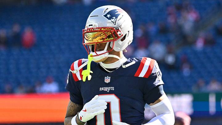 Nov 2, 2025; Foxborough, Massachusetts, USA; New England Patriots cornerback Christian Gonzalez (0) warms up before a game against the Atlanta Falcons at Gillette Stadium. Mandatory Credit: Eric Canha-Imagn Images