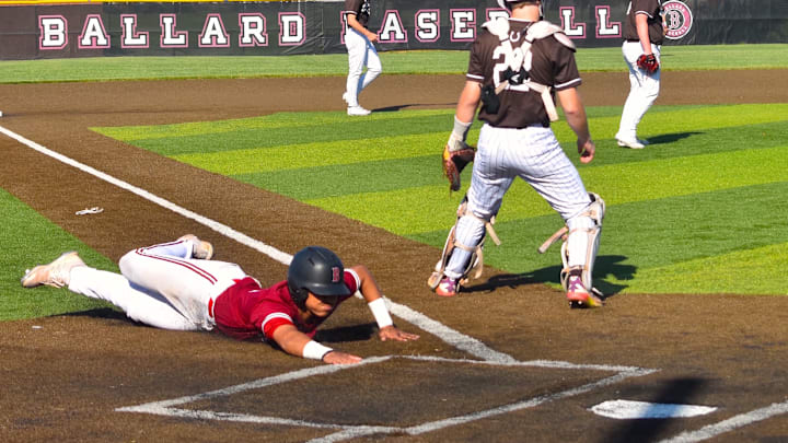 Ballard High School player Braylen Tillman slides into home plate in a game against DeSales High School May 12, 2026. Ballard has been highly competitive in 2026, but was recently displaced in the Big Four, along with St. X, by the rising South Oldham Dragons and Sayre Spartans.