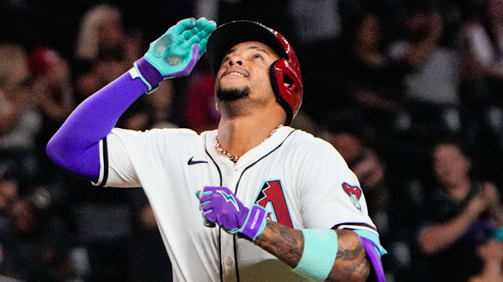 Sep 2, 2025; Phoenix, Arizona, USA; Arizona Diamondbacks second base Ketel Marte (4) celebrates his three run home run in the seventh inning of the game between Arizona Diamondbacks and Texas Rangers at Chase Field. Mandatory Credit: Arianna Grainey-Imagn Images