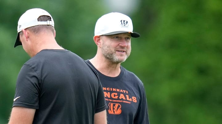 Cincinnati Bengals head coach Zac Taylor and director of player personnel Duke Tobin talk during practice at the Paycor Stadium practice field in downtown Cincinnati on Wednesday, Aug. 20, 2025.
