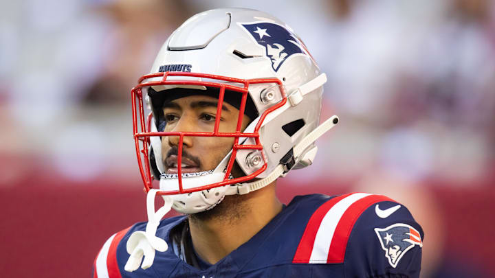 Dec 15, 2024; Glendale, Arizona, USA; New England Patriots wide receiver Ja'Lynn Polk (1) against the Arizona Cardinals at State Farm Stadium. Mandatory Credit: Mark J. Rebilas-Imagn Images