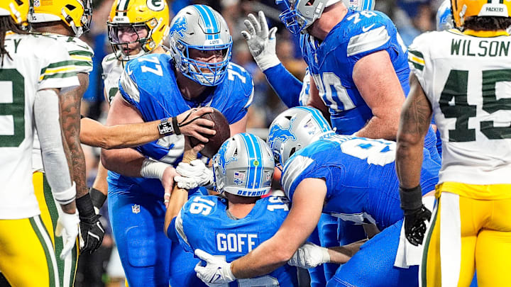 Detroit Lions center Frank Ragnow (77) and offensive tackle Dan Skipper (70)