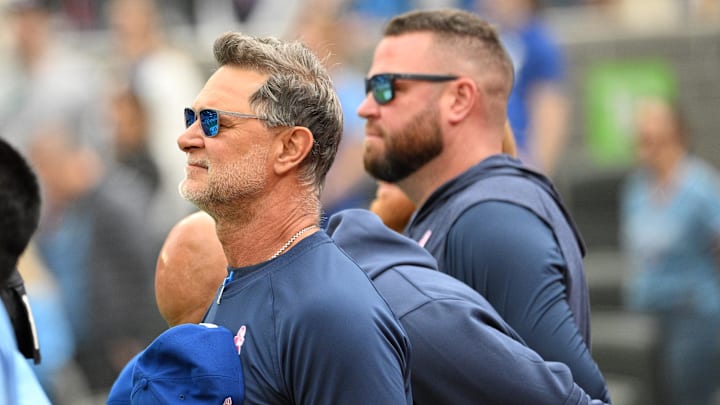 May 12, 2024; Toronto, Ontario, CAN;  Toronto Blue Jays bench coach and offensive co-ordinator Don Mattingly (23) stands for the national anthems with manager John Schneider (14) before playing the Minnesota Twins at Rogers Centre. Mandatory Credit: Dan Hamilton-Imagn Images