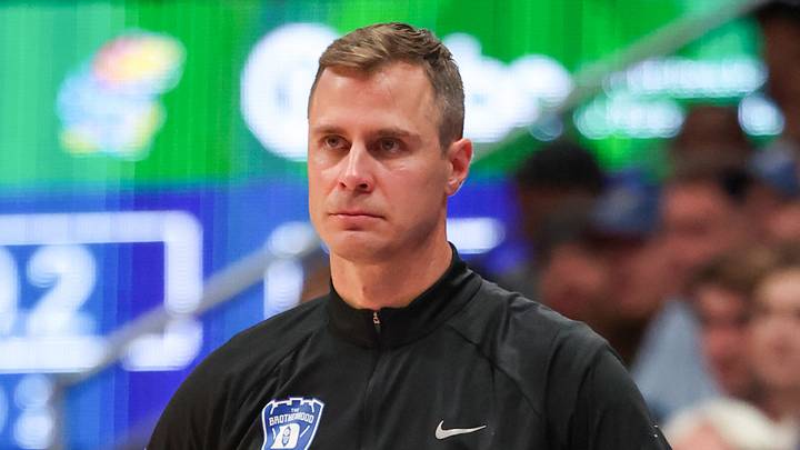 Oct 25, 2026; Lawrence, Kansas, USA; Duke Blue Devils head coach Jon Scheyer looks on during the second half against the Kansas Jayhawks at Allen Fieldhouse. Mandatory Credit: Scott Sewell-Imagn Images Oct 25, 2026; Lawrence, Kansas, USA; Duke Blue Devils head coach Jon Scheyer looks on during the second half against the Kansas Jayhawks at Allen Fieldhouse. Mandatory Credit: Scott Sewell-Imagn Images