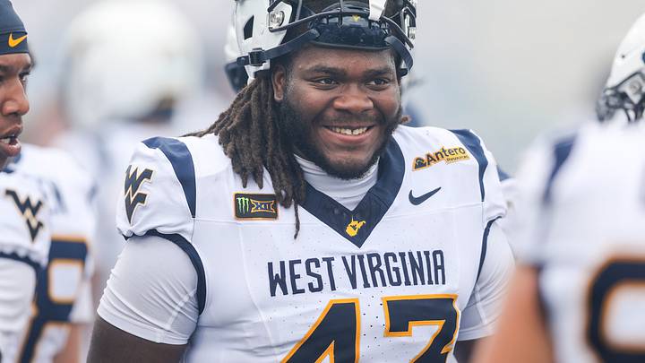 Sep 5, 2026; Morgantown, West Virginia, USA; West Virginia Mountaineers defensive lineman K.J. Henson (43) along the sideline during the fourth quarter against the Coastal Carolina Chanticleers at Milan Puskar Stadium. Mandatory Credit: Ben Queen-Imagn Images Sep 5, 2026; Morgantown, West Virginia, USA; West Virginia Mountaineers defensive lineman K.J. Henson (43) along the sideline during the fourth quarter against the Coastal Carolina Chanticleers at Milan Puskar Stadium. Mandatory Credit: Ben Queen-Imagn Images