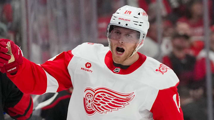 Dec 27, 2025; Raleigh, North Carolina, USA;  Detroit Red Wings center Andrew Copp (18) celebrates his goal against the Carolina Hurricanes during the third period at Lenovo Center. Mandatory Credit: James Guillory-Imagn Images