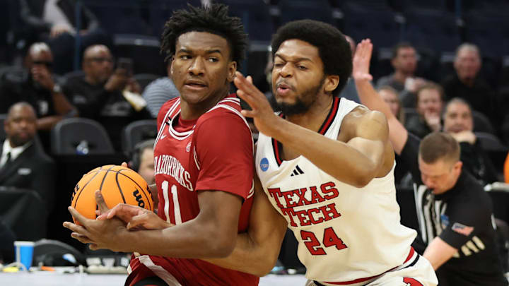 Arkansas Razorbacks guard Karter Knox drives for a layup against the Texas Tech Red Raiders in the Sweet 16.