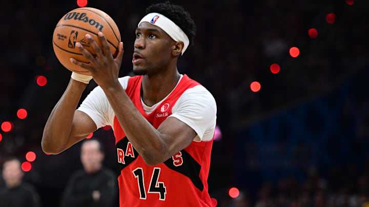 Apr 20, 2026; Cleveland, Ohio, USA; Toronto Raptors guard Ja'kobe Walter (14) shoots a three point basket during the second half during game two of the first round of the 2026 NBA Playoffs against the Cleveland Cavaliers at Rocket Arena. Mandatory Credit: David Dermer-Imagn Images