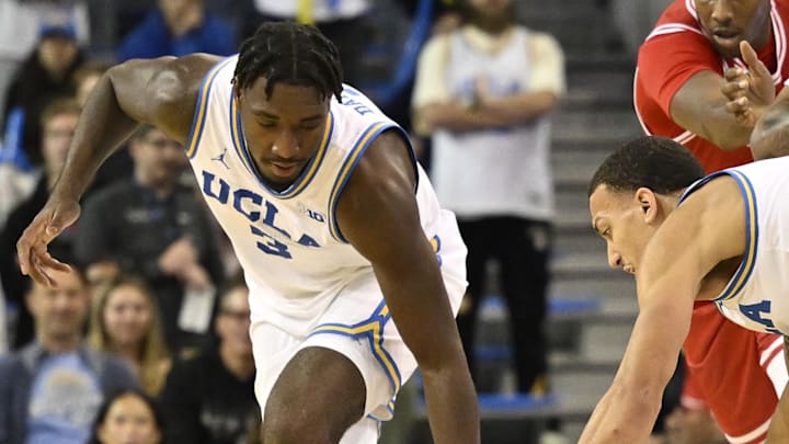 Nov 11, 2024; Los Angeles, California, USA; UCLA Bruins guards Eric Dailey Jr. (3) and Kobe Johnson (0) chase a loose ball as Boston University Terriers guard Michael McNair (20) hits the floor during the second half at Pauley Pavilion presented by Wescom. Mandatory Credit: Robert Hanashiro-Imagn Images
Nov 11, 2024; Los Angeles, California, USA; UCLA Bruins guards Eric Dailey Jr. (3) and Kobe Johnson (0) chase a loose ball as Boston University Terriers guard Michael McNair (20) hits the floor during the second half at Pauley Pavilion presented by Wescom. Mandatory Credit: Robert Hanashiro-Imagn Images