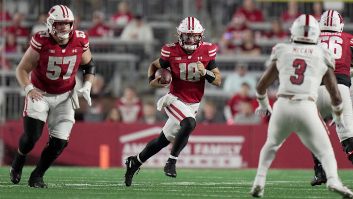 Wisconsin quarterback Danny O'Neil (18) runs during the third quarter of their game against Miami (Ohio) Thursday, August 28, 2025 at Camp Randall Stadium in Madison, Wisconsin. Wisconsin quarterback Danny O'Neil (18) runs during the third quarter of their game against Miami (Ohio) Thursday, August 28, 2025 at Camp Randall Stadium in Madison, Wisconsin.