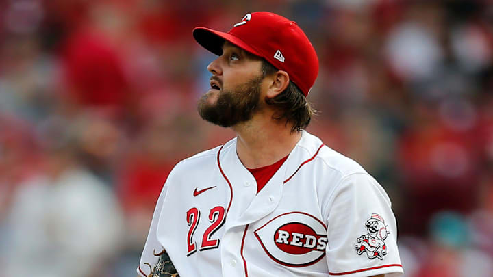 Cincinnati Reds starting pitcher Wade Miley (22) watches