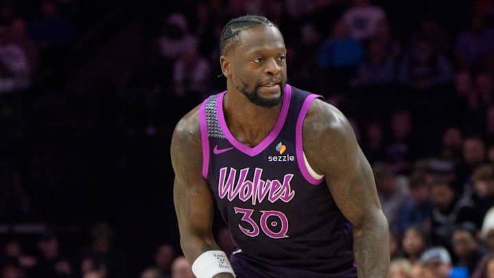 Jan 25, 2026; Minneapolis, Minnesota, USA; Minnesota Timberwolves forward Julius Randle (30) guarded by Golden State Warriors center Al Horford (20) in the first quarter at Target Center. Mandatory Credit: Matt Blewett-Imagn Images
